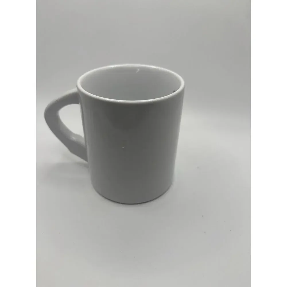 Very Unique Basketball Coffee Mug handle is the arm dunking basketball